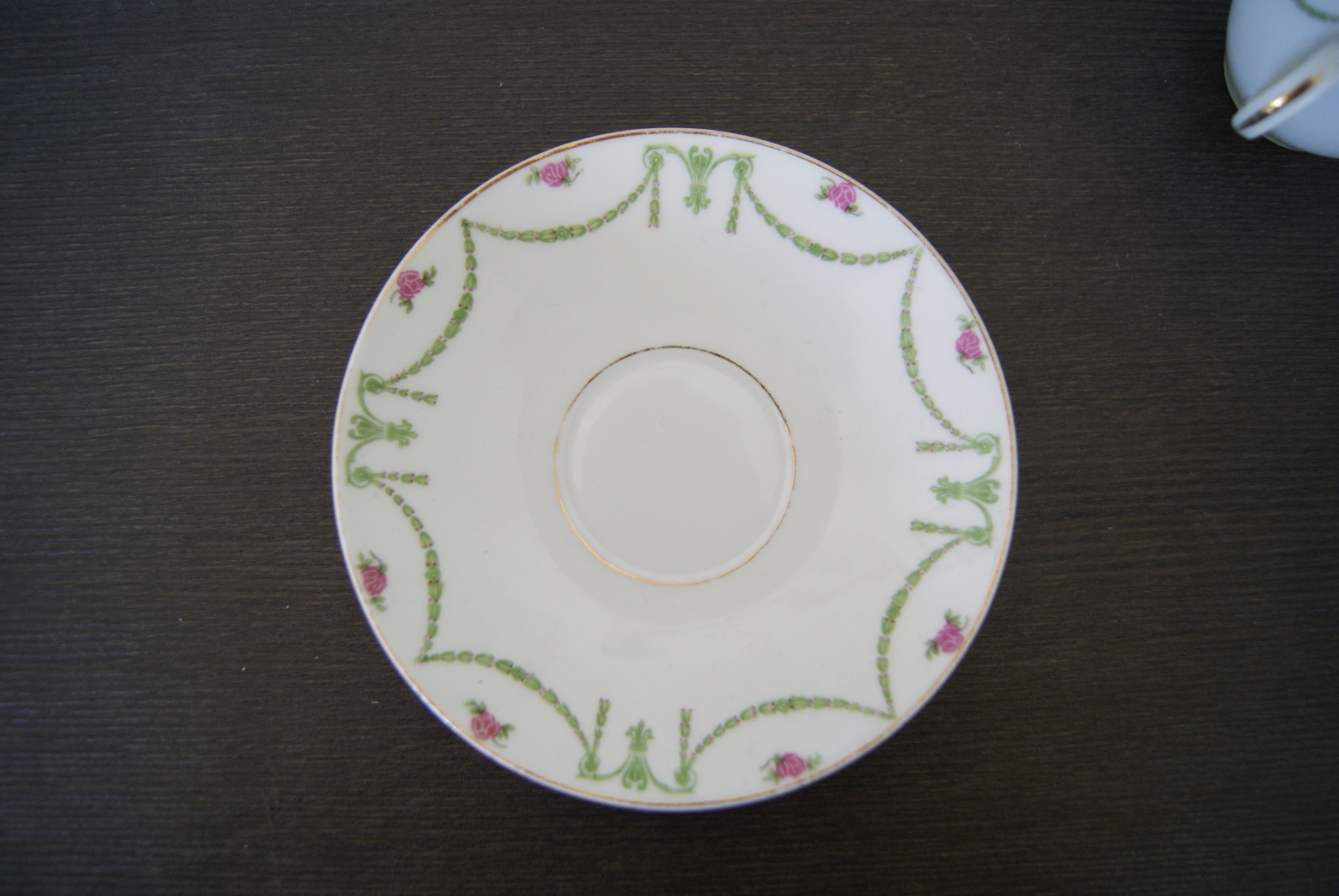 Porsgrund cup with saucer flowers with green garlands