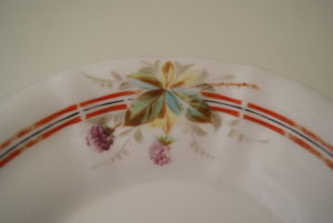 Waldenburg - Altwasser dish with red and black band, leaves and blackberries