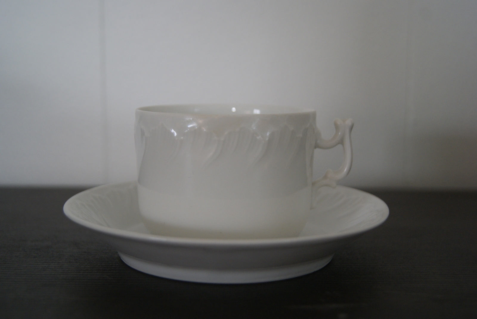 Porsgrund cup with saucer white with relief