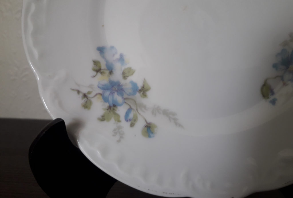 Porsgrund plate model “rococo” with relief, blue flowers and leaves