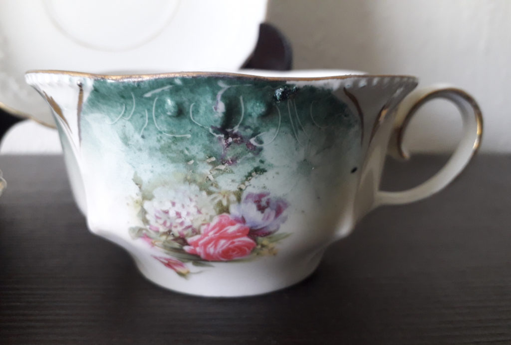 Tillowitz - tea cup and saucer with flowers and relief