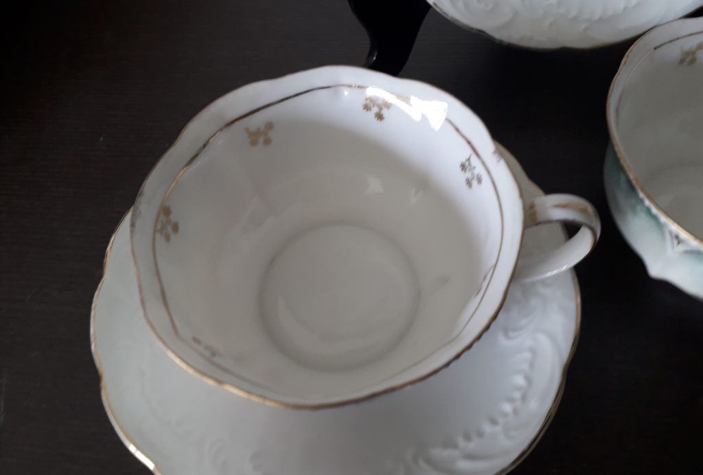 Tillowitz - tea cup and saucer with flowers and relief