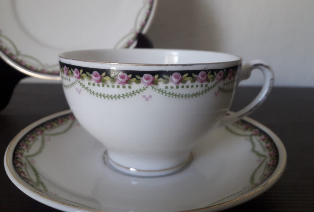 Waldenburg coffee cup, saucer and plate with black band, roses and garlands