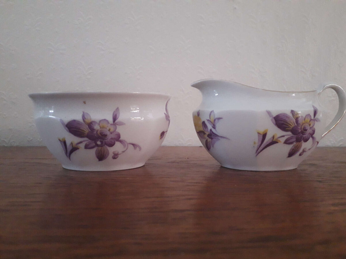 Parowa (Tiefenfurt) milk jug and sugar bowl with yellow and purple flower