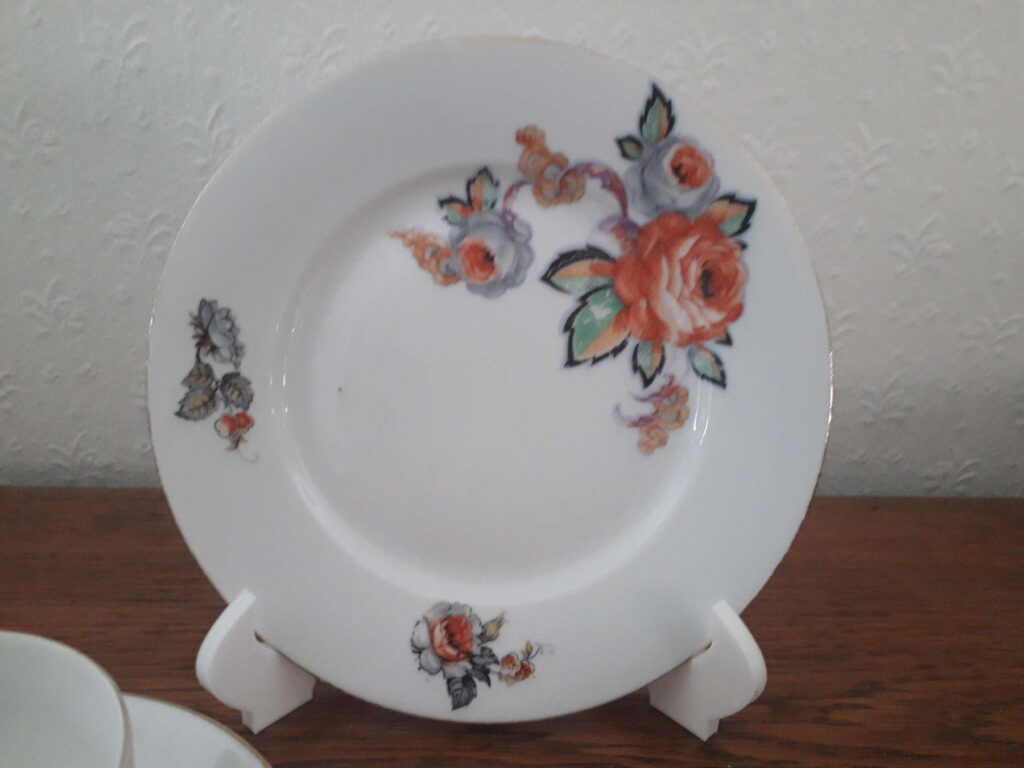 Porsgrund cup with saucer and plate with flowers, roses and grey leaves