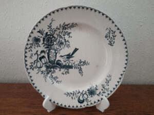 Egersunds Fayancefabrik plate with blue decor, flowers, fruits, bird and relief