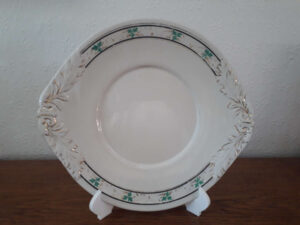 Egersunds Fayancefabrik plate with green leaves, black lines and golden decor
