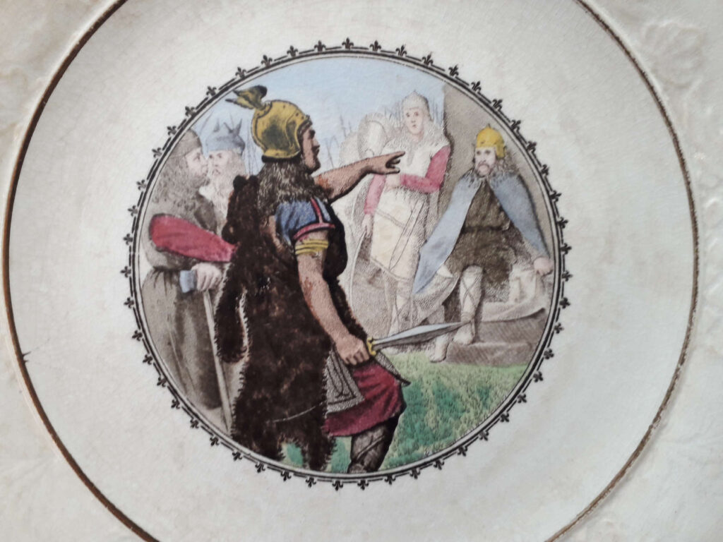 Egersunds Fayancefabrik plate with relief decorated with a Frithiofs Saga motiv