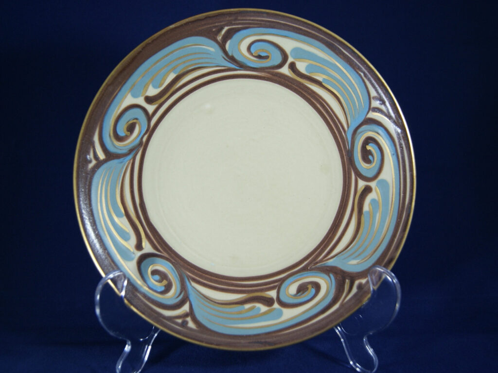 Egersunds Fayancefabrik plate with blue, brown and golden decor